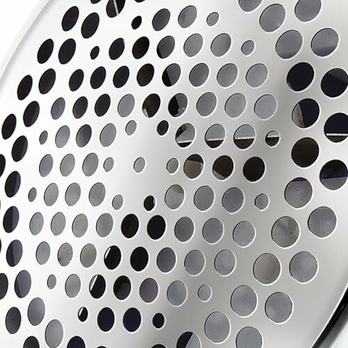 Surface métallique avec des trous circulaires